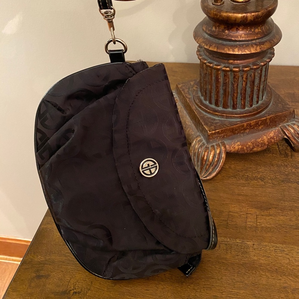 Wristlet by Gianni Bernini in all black.